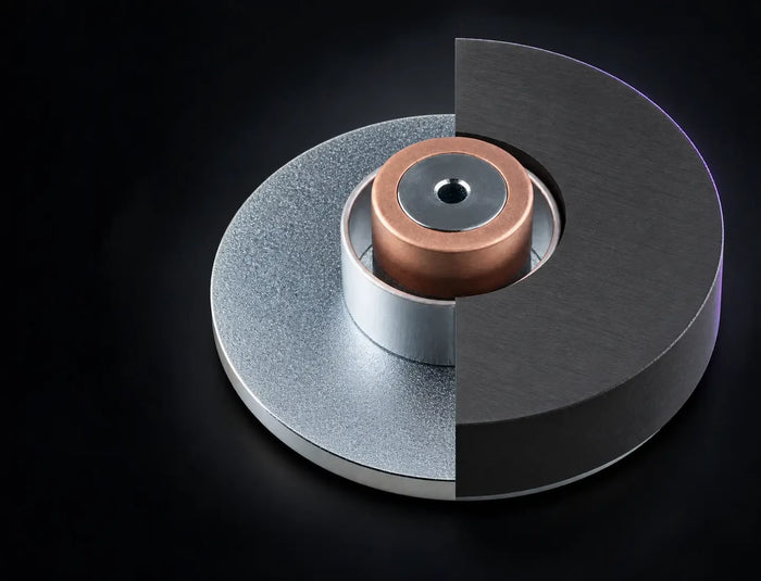 Cutaway of the MiniMax3 woofer motor with the copper Faraday ring and the demodulation ring